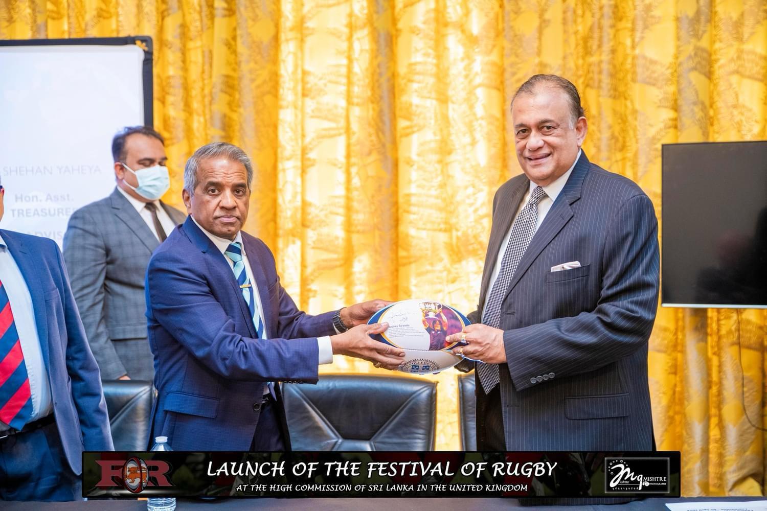 Festival of Rugby launch guests standing by the event table